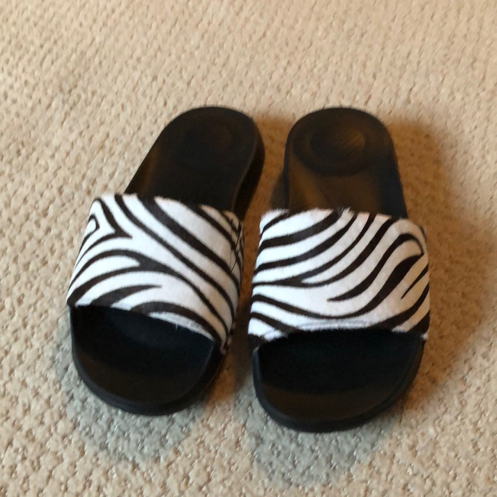 Zebra furry flip flops
